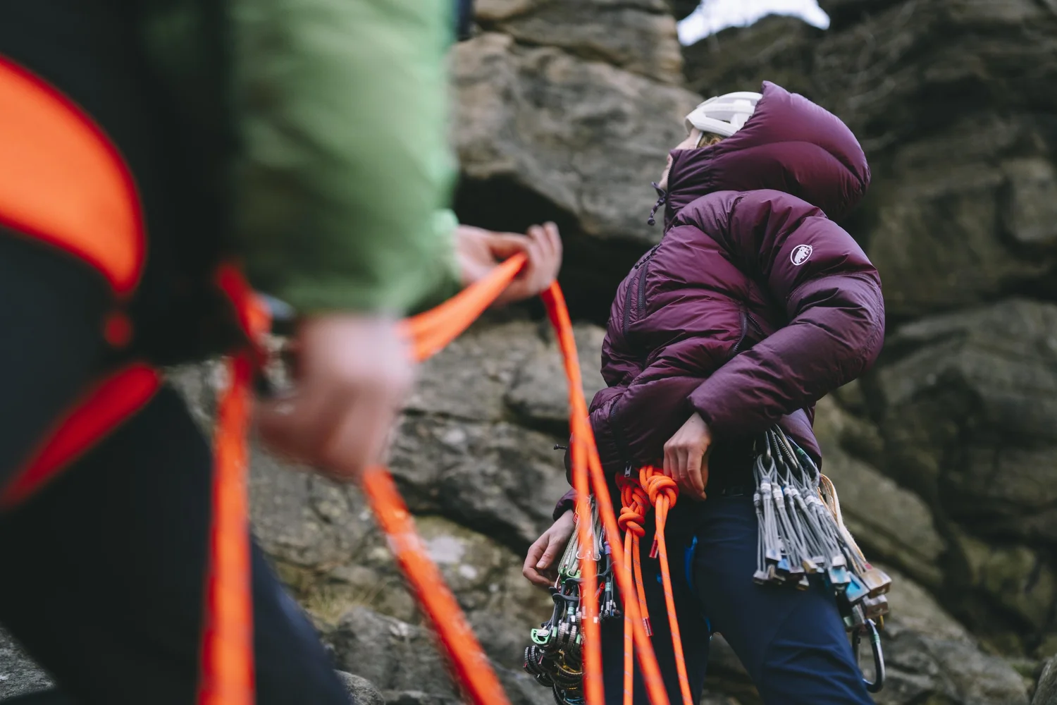 Climber racking gear at Stanage Edge