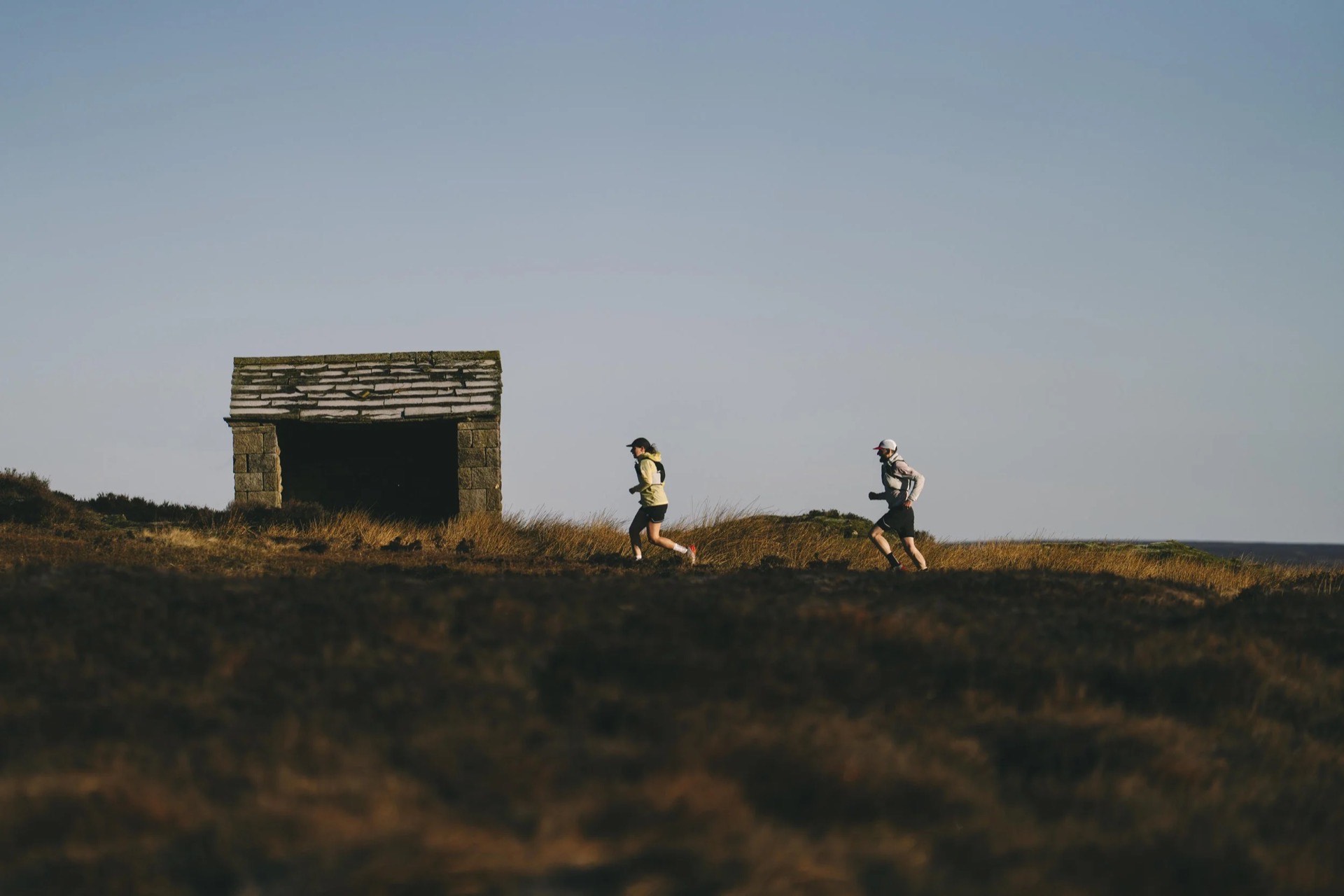 Trail runners on moorland